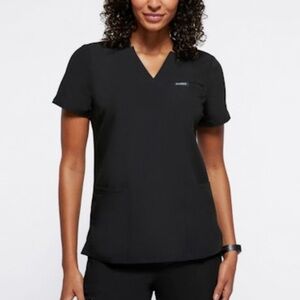 Jaanuu Helia Notched V-Neck 3-Pocket Scrub Top in Black